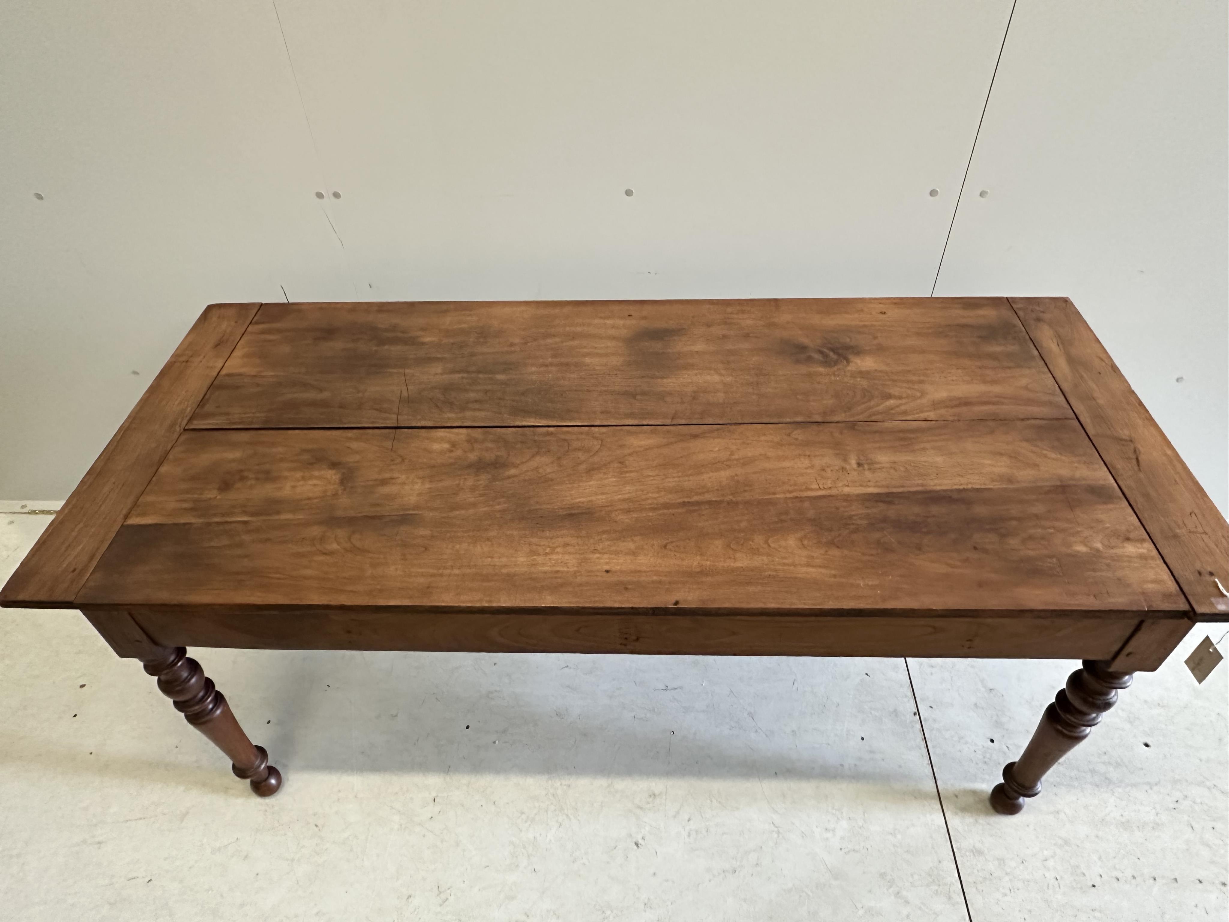 A 19th century French rectangular cherry farmhouse table, width 167cm, depth 73cm, height 73cm. Condition - fair